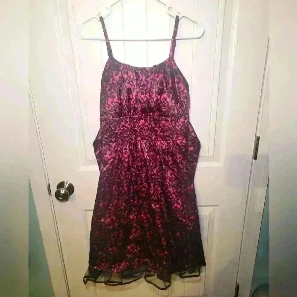 Y2k Taboo dress size 6 With adjustable straps, pull back belt, ruffled bottom.